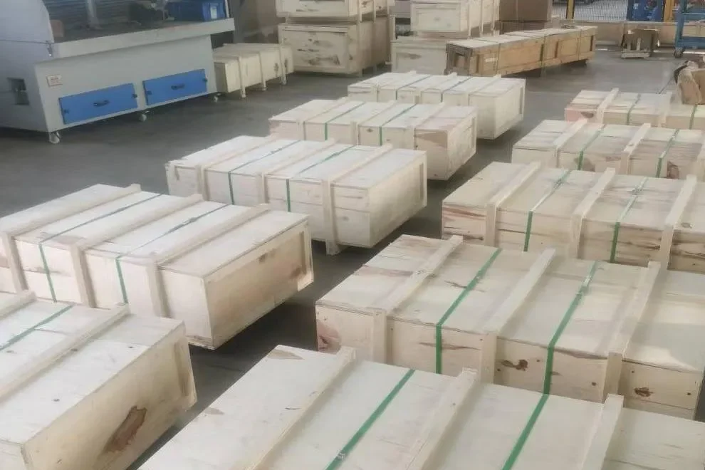 Securely packed screw jacks in wooden crates ready for fast international delivery.