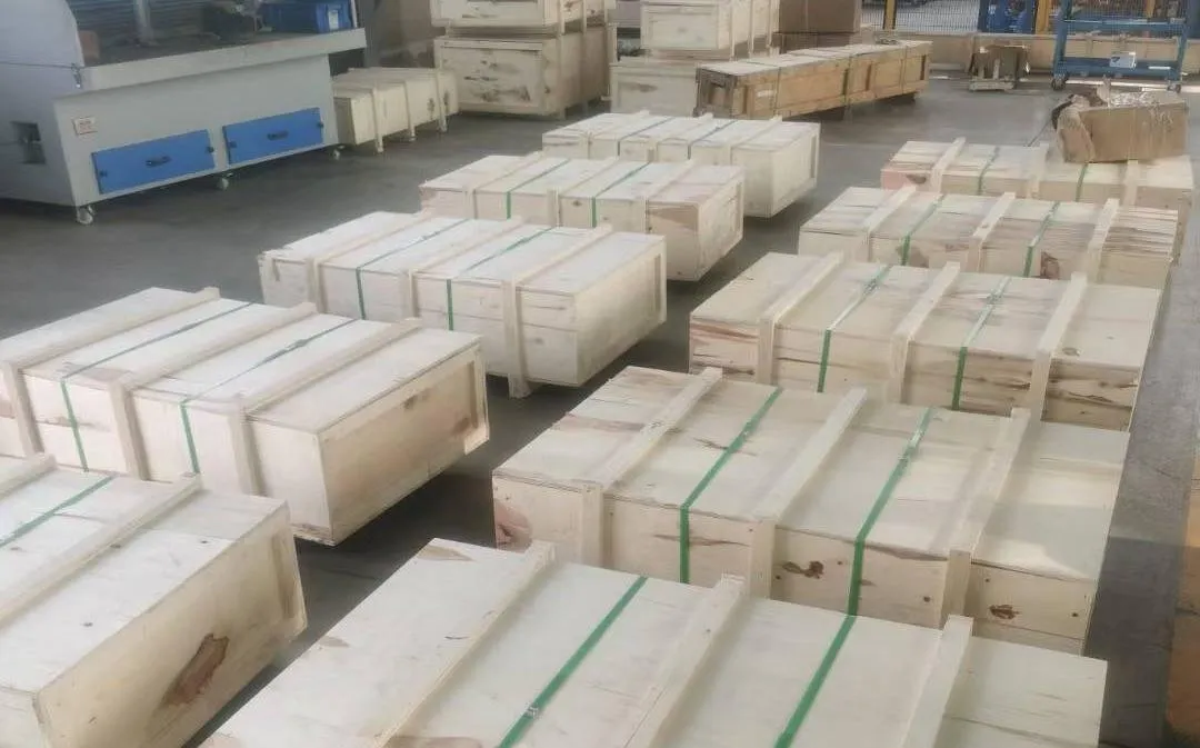 Securely packed screw jacks in wooden crates ready for fast international delivery.