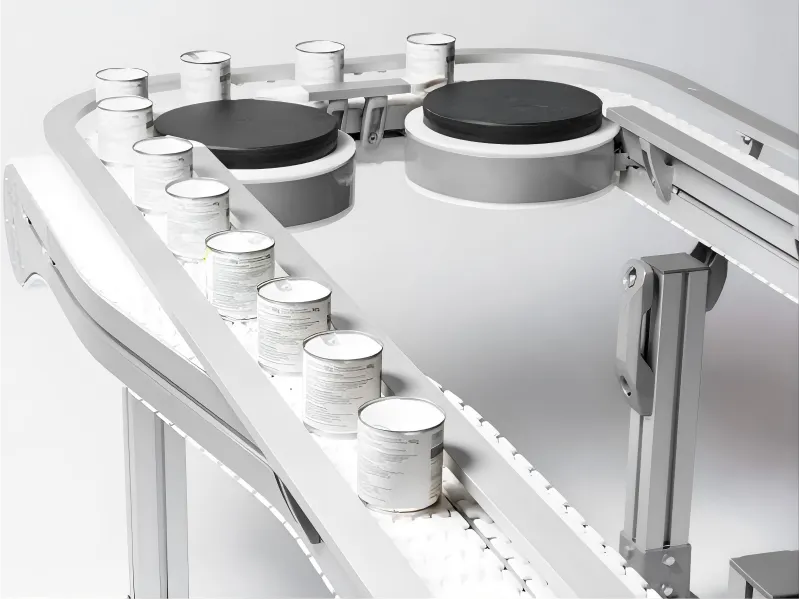 Precision stainless steel gearbox driving a continuous washdown conveyor system. Keeps packaging production lines clean and efficiently replaces standard industrial drives.